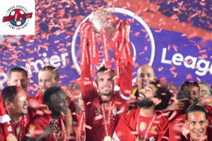 Liverpool players celebrating with a trophy