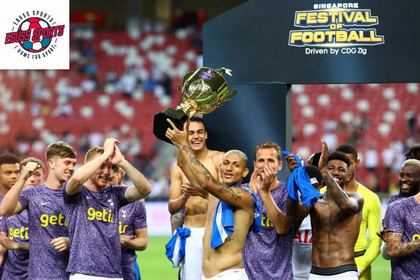 Tottenham richest football club celebrating trophy